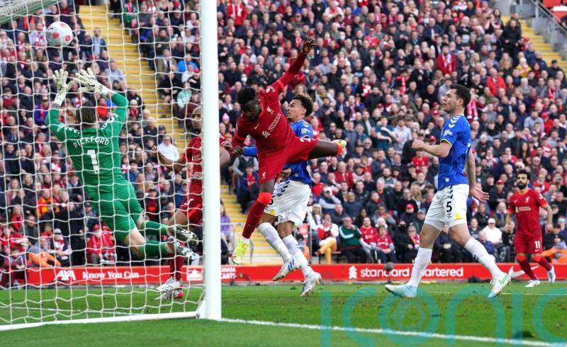 Liverpool win derby to keep quadruple bid on track and add to Everton’s woes