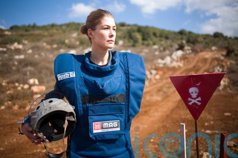 Actress Rosamund Pike backs campaign to clear unexploded bombs in Laos
