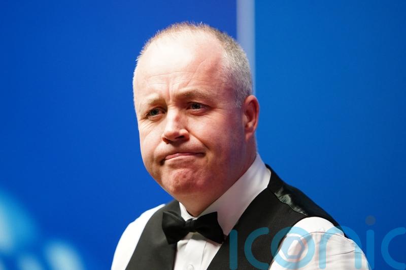 John Higgins gets a ‘bit of rhythm going’ as he reaches last eight in Sheffield