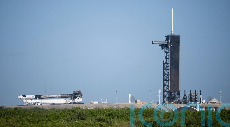 Trio back on Earth after charter trip to space station