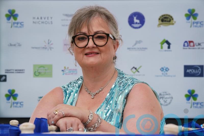 Lotto winner who has given away half of £115m winnings says helping is addictive