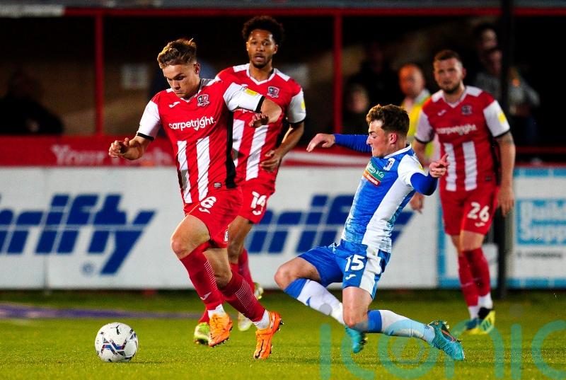 Exeter promoted to League One after victory over Barrow