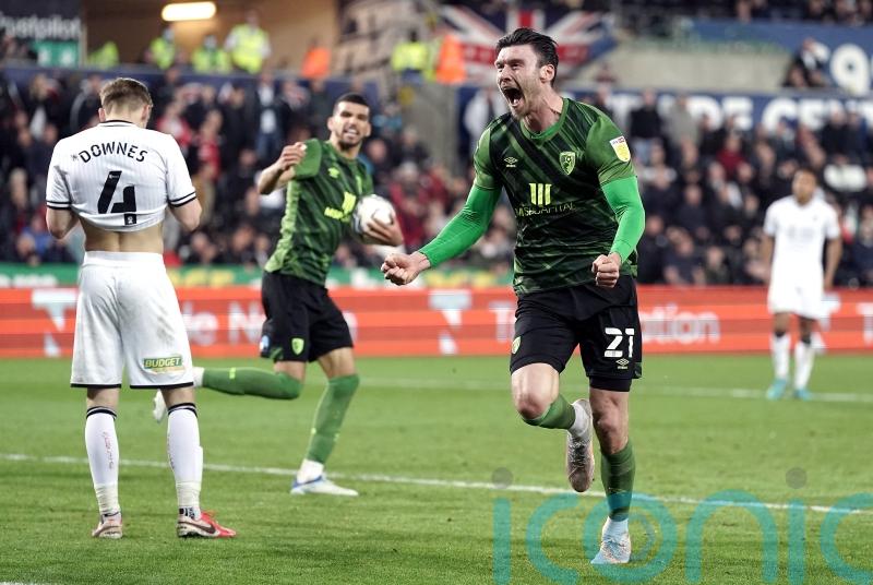 Bournemouth come from three goals to claim a vital point in their promotion push
