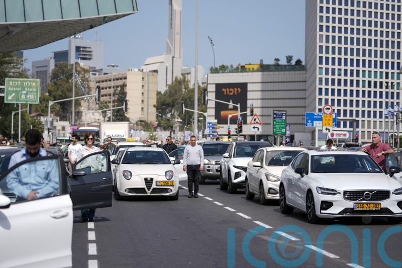 Israel halts for annual Holocaust day and honours six million murdered Jews