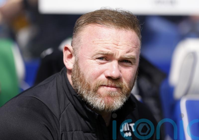 Wayne Rooney dismisses speculation linking him with Burnley job