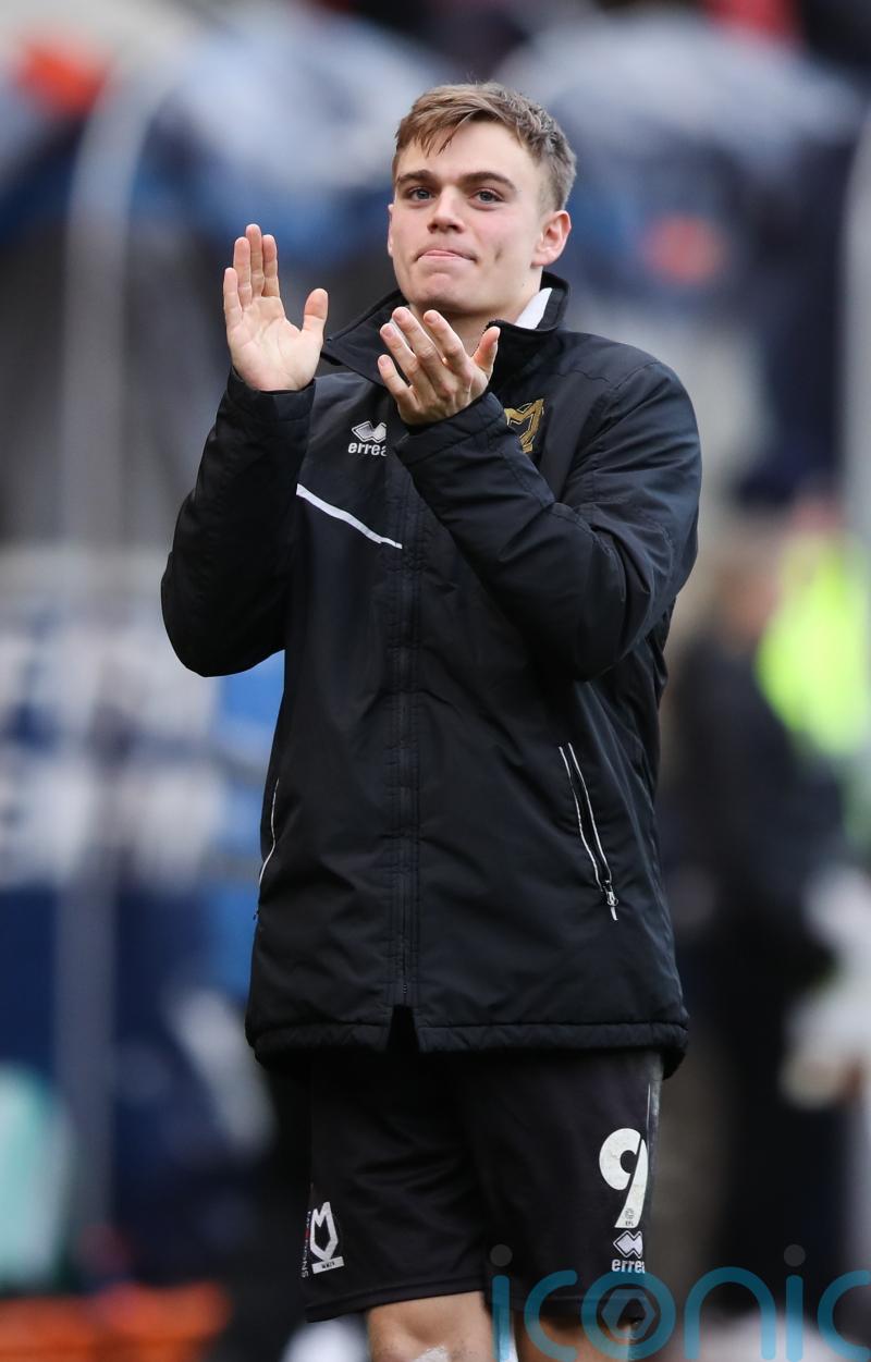Four-goal Scott Twine inspires MK Dons to thumping win at 10-man Plymouth