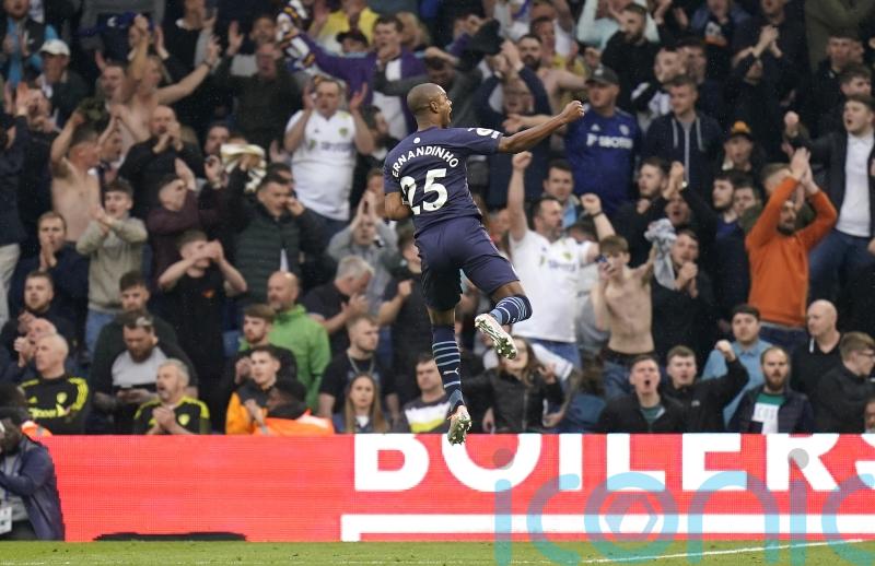 Man City put four past Leeds to take top spot right back from Liverpool