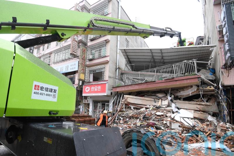 Woman rescued 50 hours after China building collapse