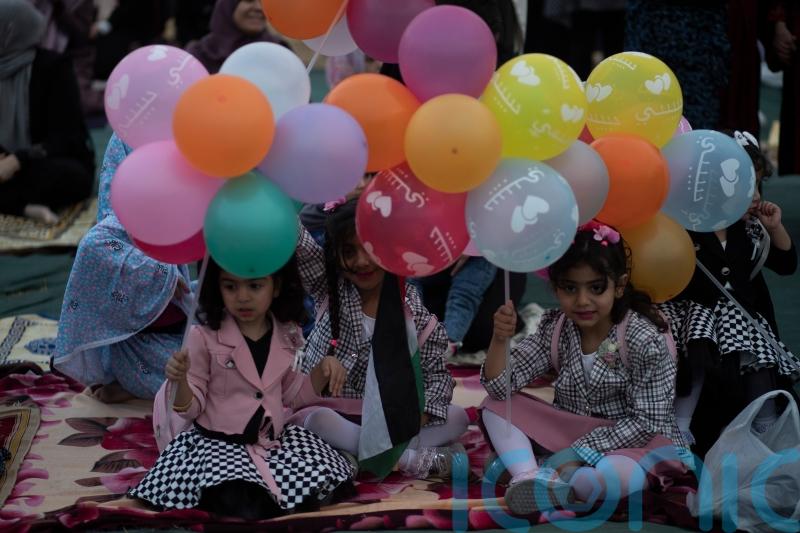Muslims mark Eid al-Fitr holiday