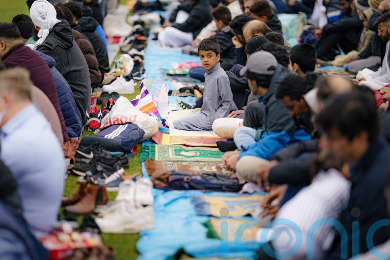 In Pictures: Communities gather in prayer to mark end of Ramadan