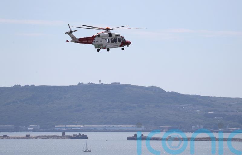 Search under way for person who fell overboard off Dorset coast at 2am