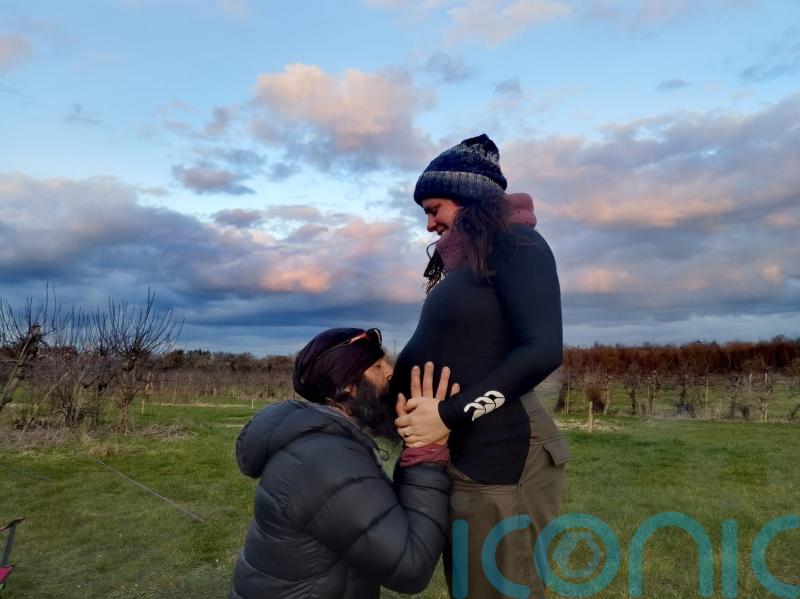 Ex-paratrooper welcomes baby boy with woman he met walking UK coast for charity