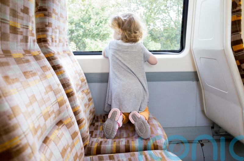 Train firms ‘failing dismally’ to help families with young children – report