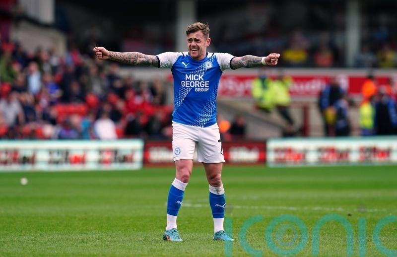 Relegated Peterborough sign off with thumping win over Blackpool