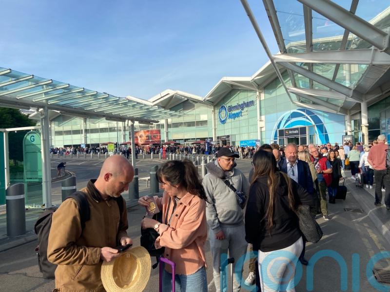 Airline passengers forced to wait outside airport for hours