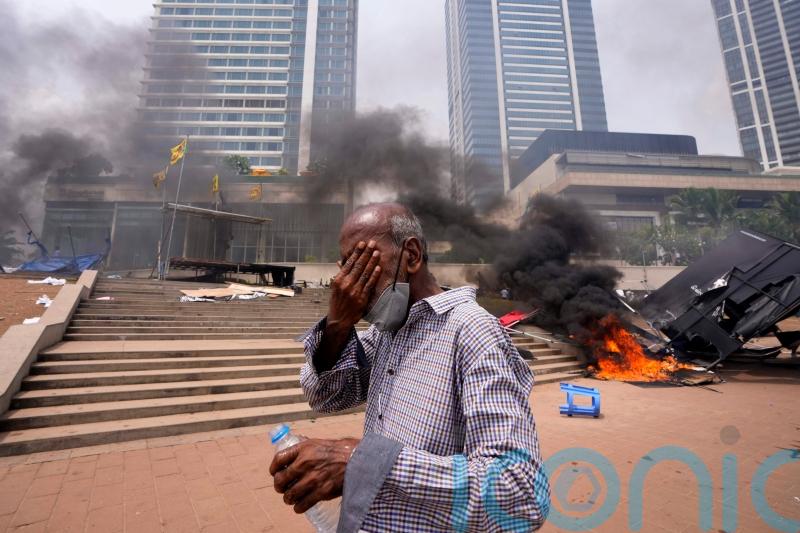 Sri Lankan prime minister quits after weeks of protests