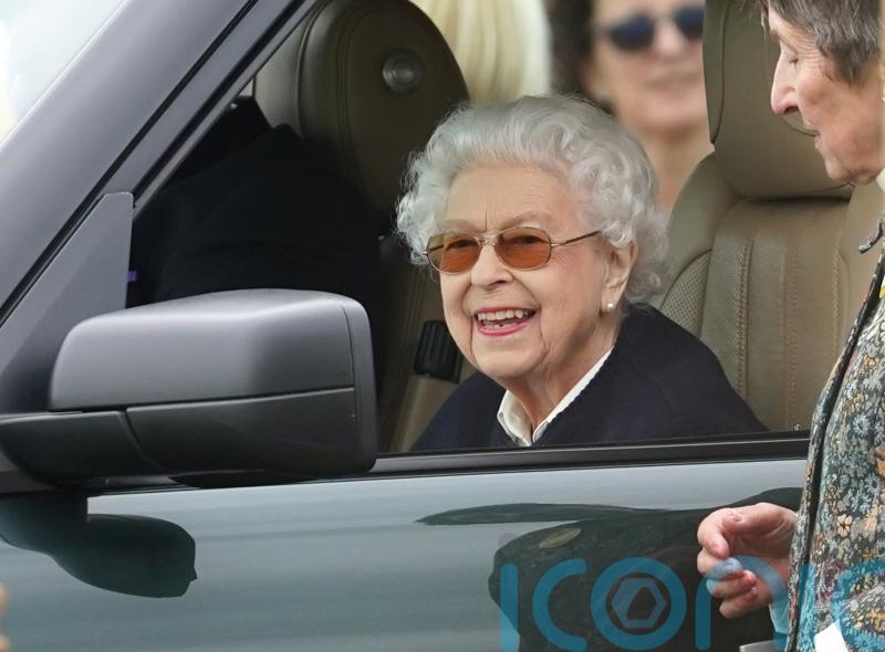 Smiling Queen arrives at Royal Windsor Horse Show
