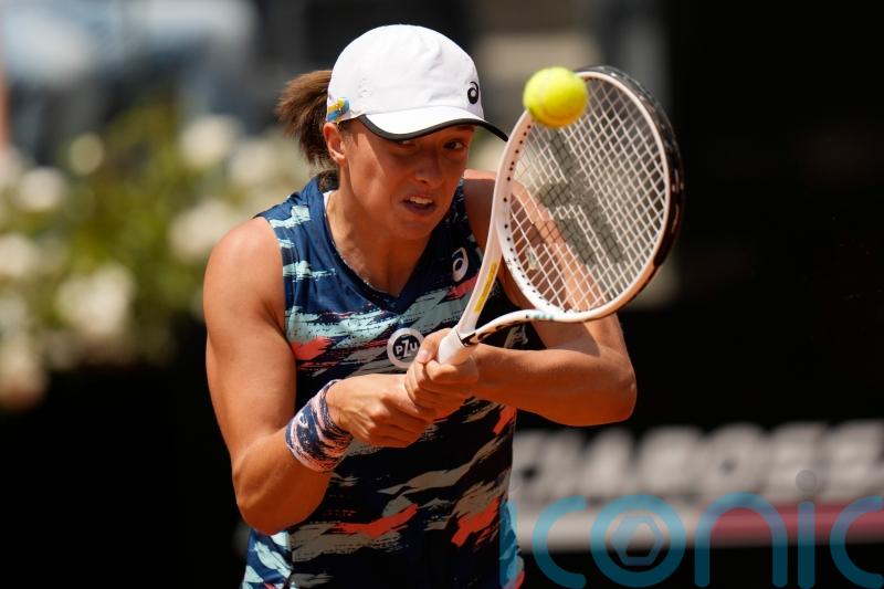 Iga Swiatek continues winning run to lift Italian Open crown