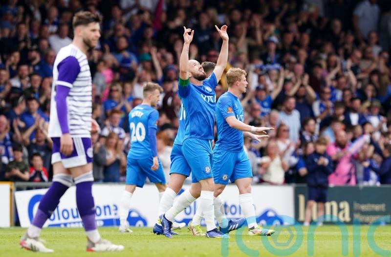 Stockport hold their nerve to wrap up National League title