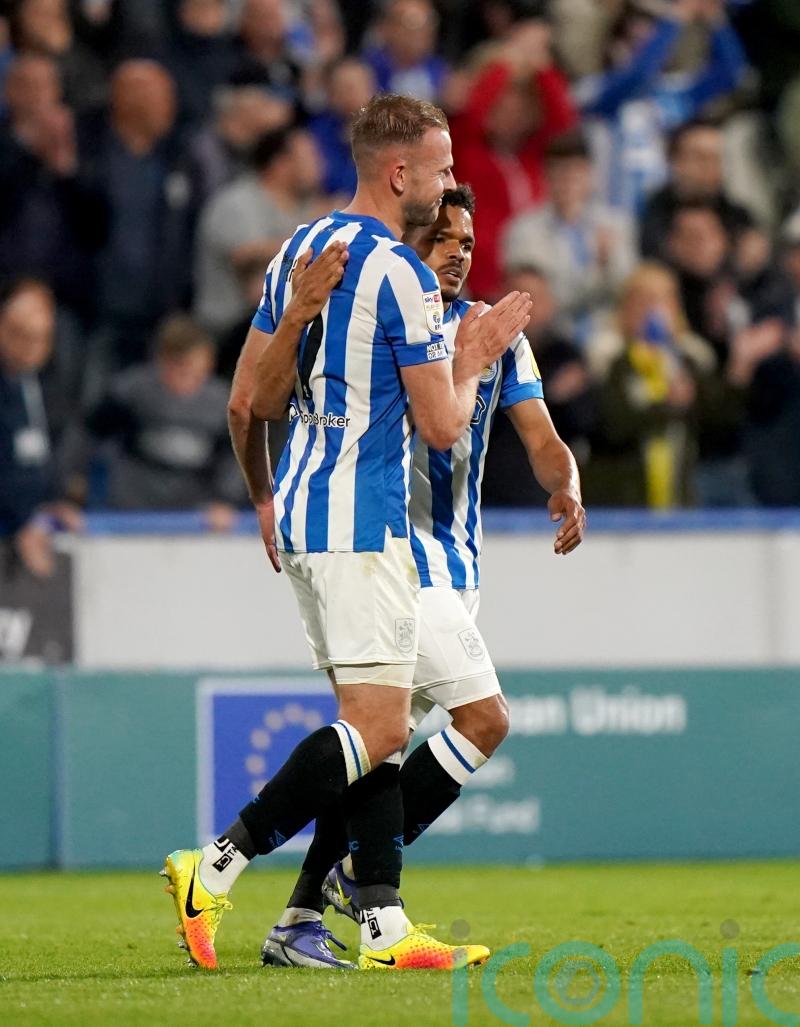 Late Jordan Rhodes goal in semi-final second leg sends Huddersfield to Wembley