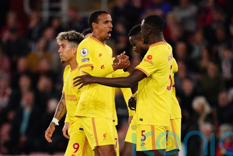 Liverpool take title race to the final day with comeback victory at Southampton