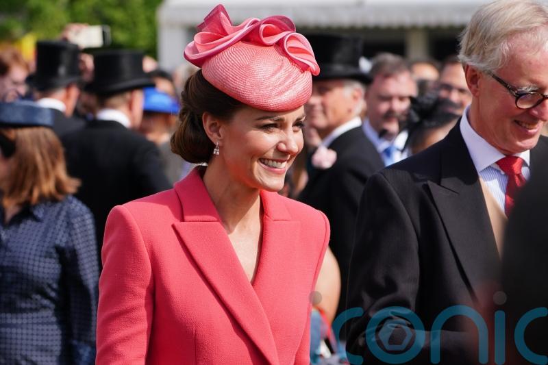 Kate delights at sunsoaked Buckingham Palace garden party