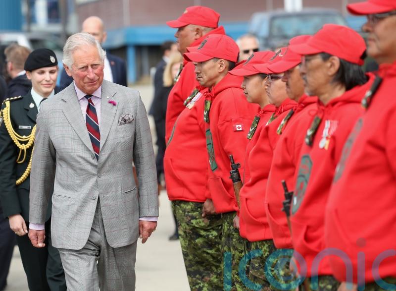 Charles test drives Canadian Rangers’ snowmobile