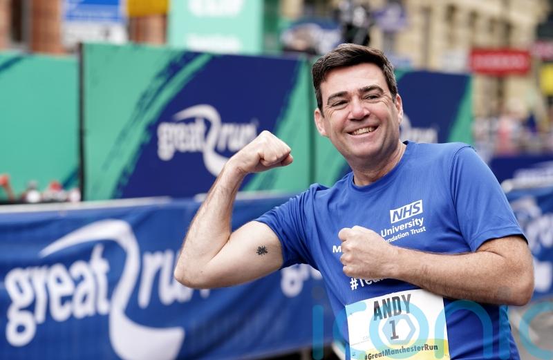 Mayor Andy Burnham leads anniversary tributes to Manchester Arena attack victims