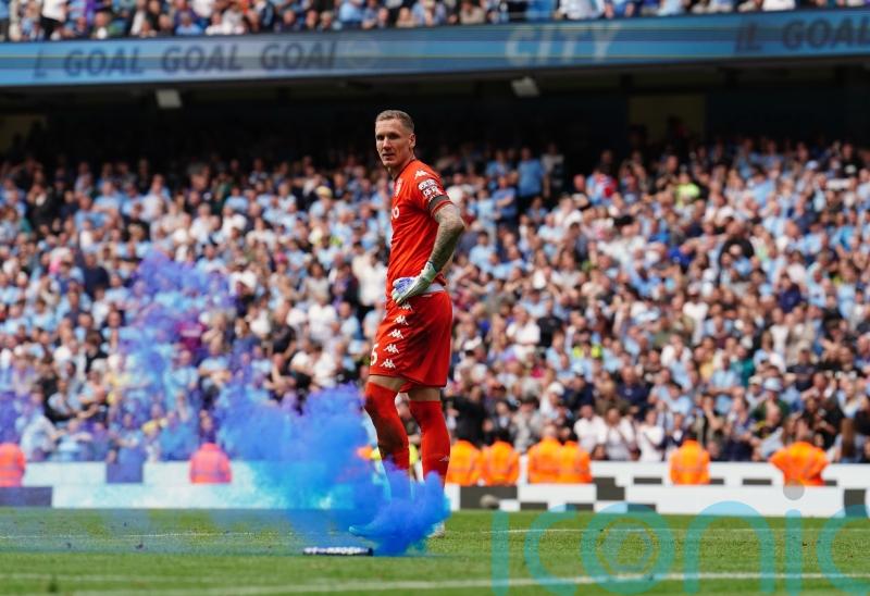 Man City pledge to ban fan after attack on Robin Olsen during pitch invasion