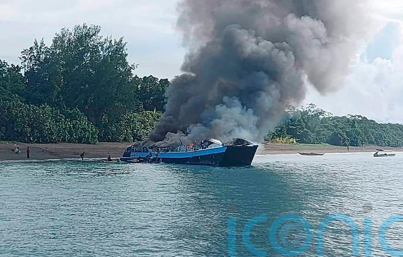 Seven dead and more than 120 rescued from water after ferry fire in Philippines