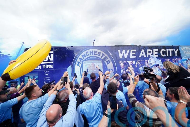 Two men charged after Manchester City title celebrations