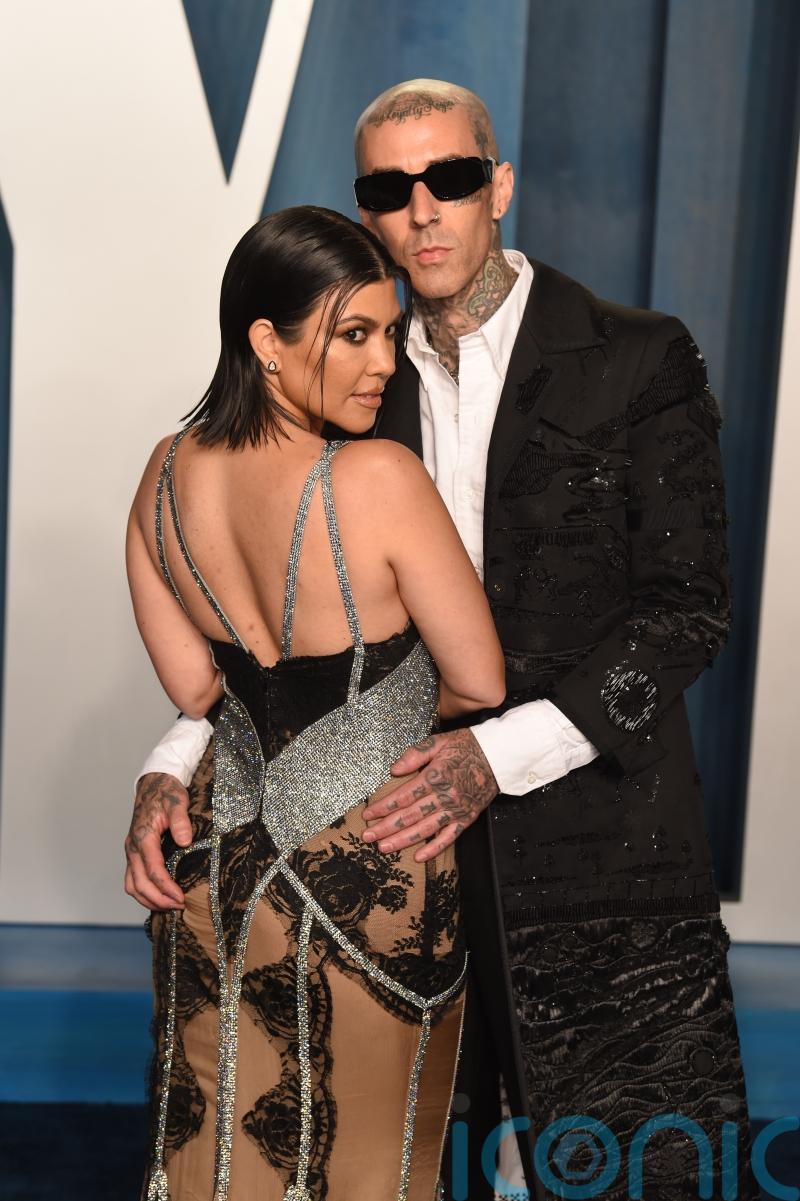 Kardashian family share photos following wedding of Kourtney and Travis Barker