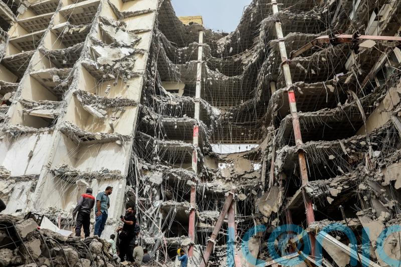 Iran building collapse kills 14 as mayor and others detained