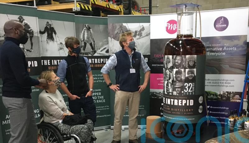 World’s largest bottle of whisky sells for £1.1m at auction