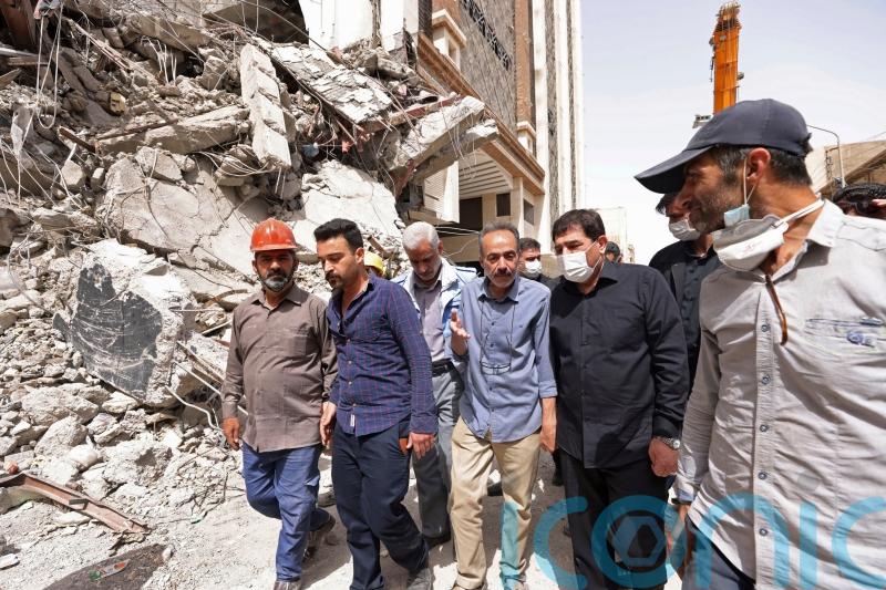 Iranian police disperse crowd gathered at collapsed building
