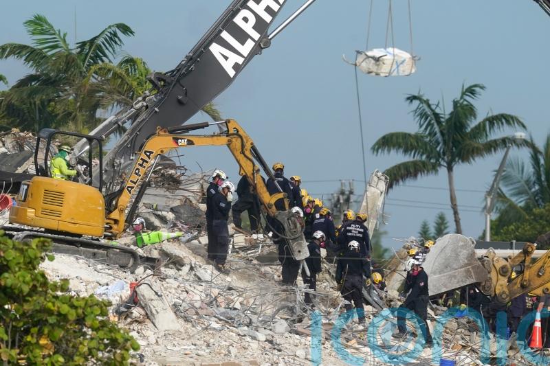 Judge in US gives initial OK to a billion-dollar deal in Florida condo collapse