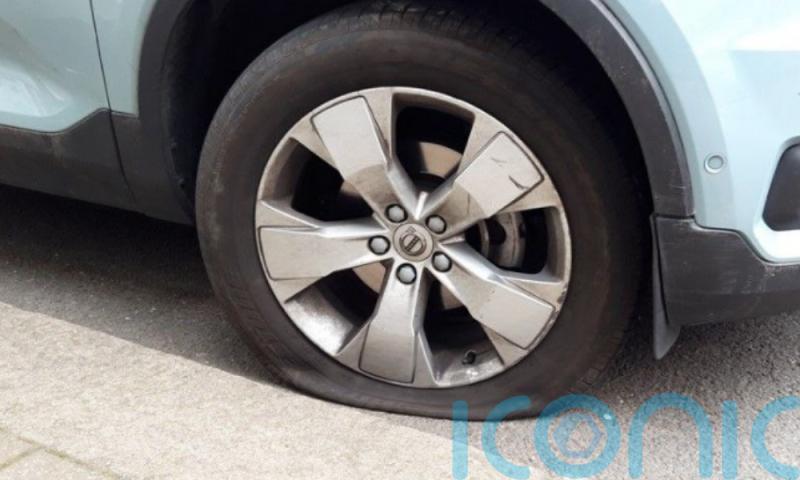 Environmental campaigners deflate tyres of 20 vehicles in Edinburgh
