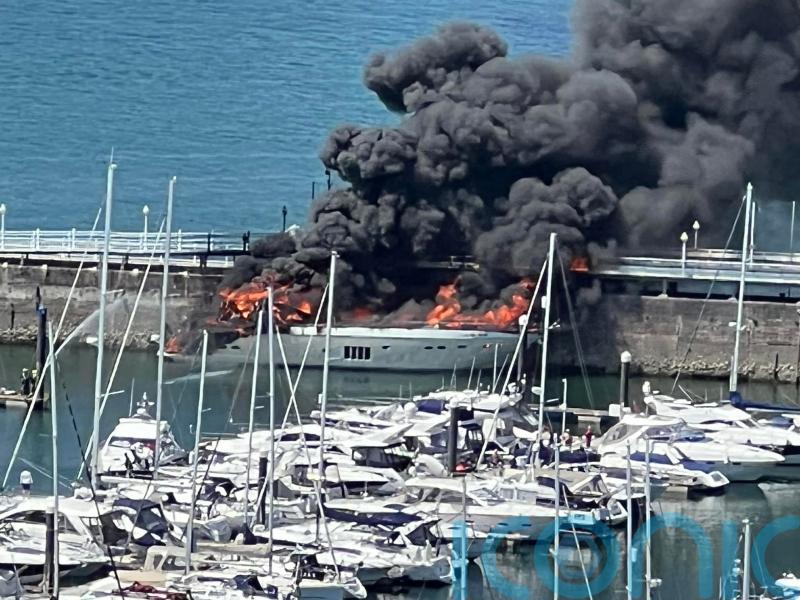 Major clean-up in marina after fire on superyacht carrying tonnes of fuel