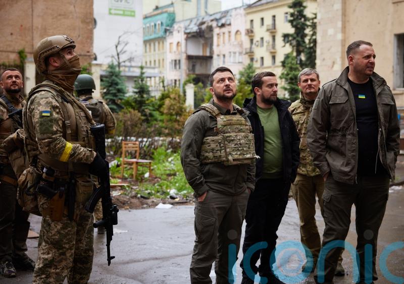 Russians storm city and shell east Ukraine as Zelensky visits Kharkiv region