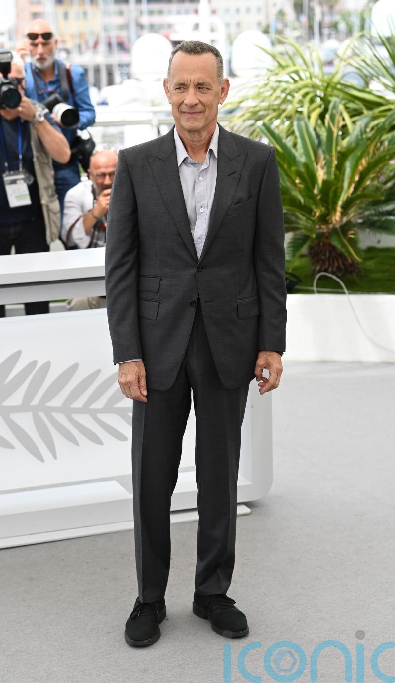 Tom Hanks reveals the Queen’s drink of choice is a martini