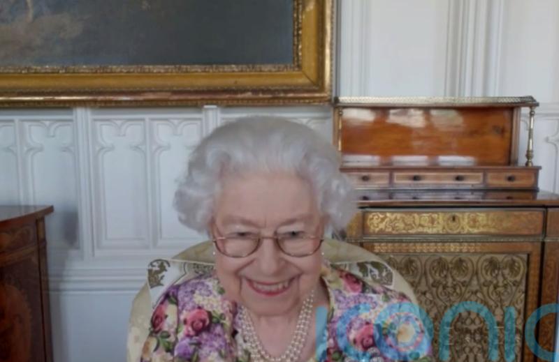 ‘Cheeky’ Queen laughs at joke during video call with Australians of the Year