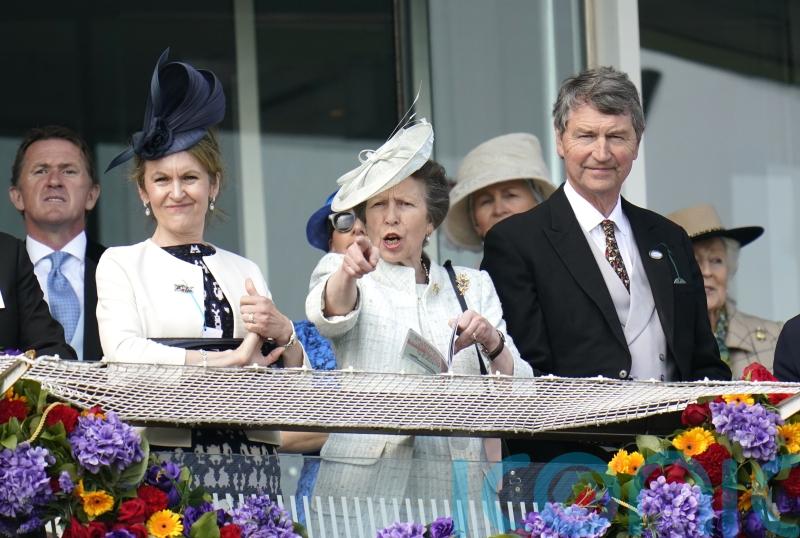 Excited Anne cheers and applauds in Queen’s absence at Epsom Derby Day