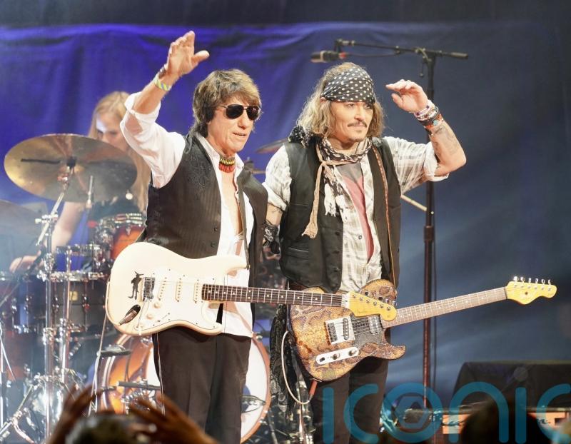 Johnny Depp returns to jazz festival as guitarist Jeff Beck’s surprise guest