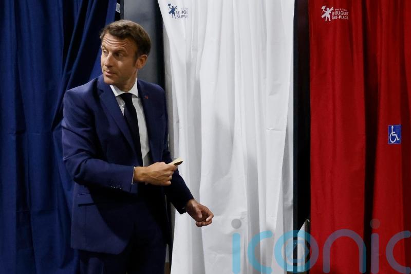 France votes in parliamentary election in vital test for Macron