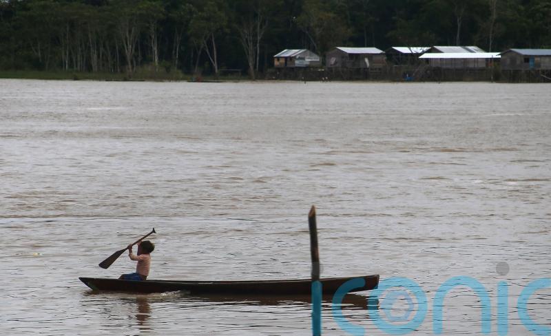 Divers find backpack and laptop in remote Amazon where Dom Phillips vanished