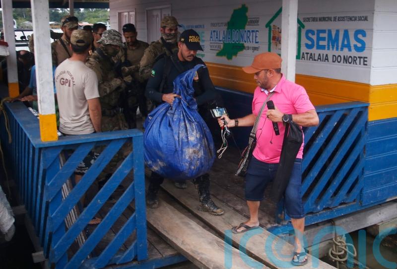 Divers find belongings of missing British journalist tied under water