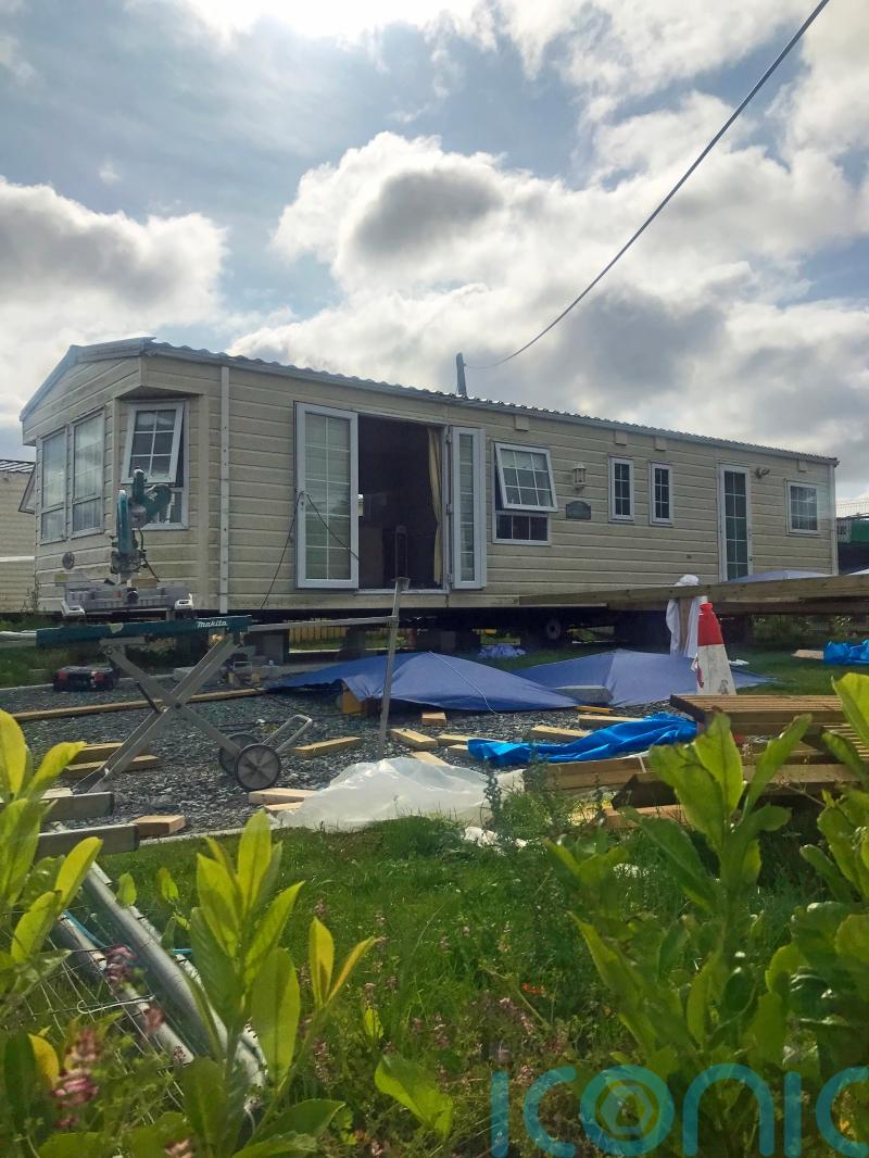 Man and woman arrested over man’s gun death at caravan park