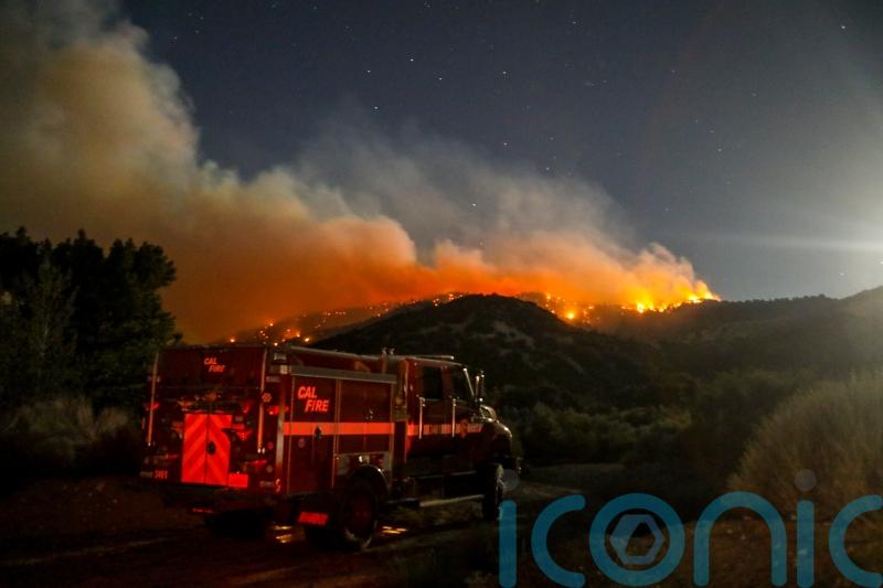 Wildfires force evacuations in Arizona and California