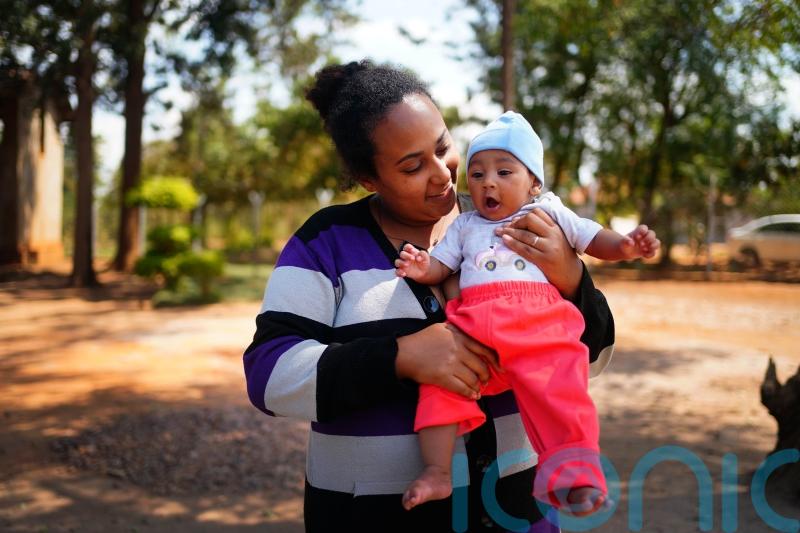 Residents at Rwandan refugee camp seek safety and a future for their children