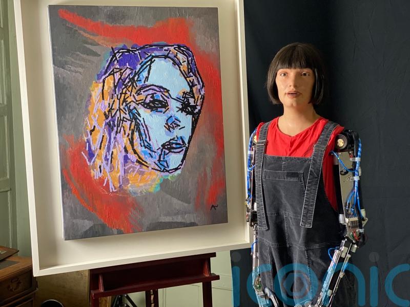 Robot artist Ai-Da paints Glastonbury headliners ahead of festival attendance